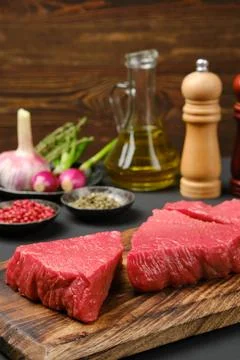 Raw uncooked beef tri-tip loin steaks with spice and seasoning Stock-Fotos