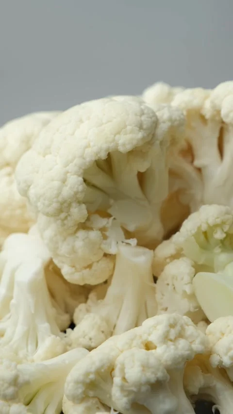Raw Uncooked Cauliflower Texture, Vertical Macro Rotation Stock Footage 312672732