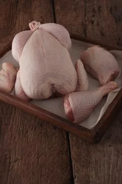 Raw uncooked chicken portion Stock Photos