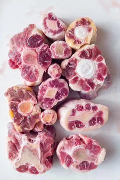 Raw uncooked ox tail Stock Photos