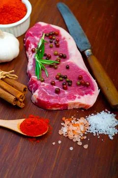 Raw uncooked ribeye beef steak butcher selection Stock Photos