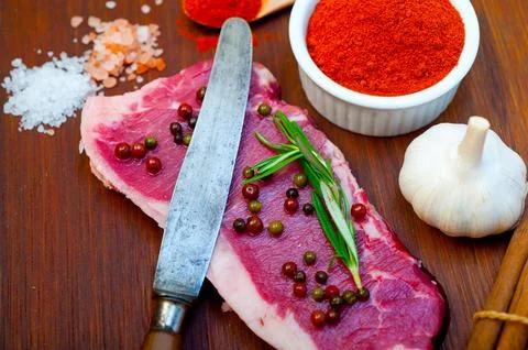 Raw uncooked ribeye beef steak butcher selection Stock Photos