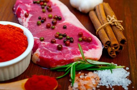 Raw uncooked ribeye beef steak butcher selection Stock Photos