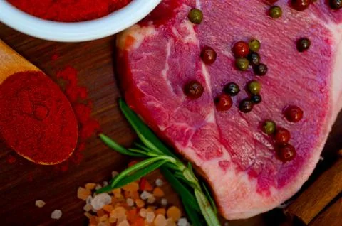 Raw uncooked ribeye beef steak butcher selection Stock Photos