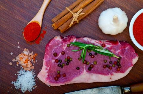 Raw uncooked ribeye beef steak butcher selection Stock Photos