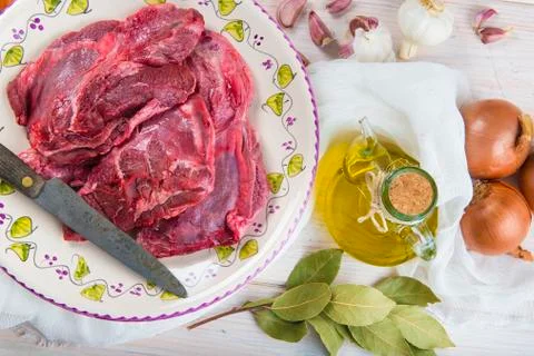 Raw veal cheeks Stock Photos