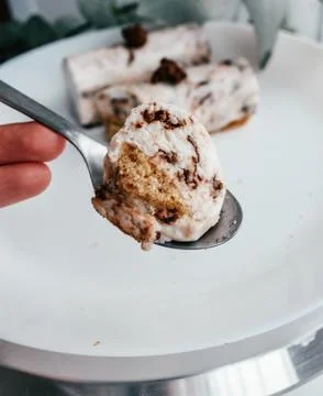 Raw vegan coco choco dessert on spoon. Coconut chocolate filling vegetarian Stock-Fotos