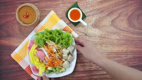 Raw vegetable salad or Asinan Betawi is a traditional food from Indonesia m.. Stock Footage 245289771