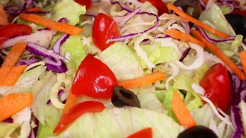Raw vegetable salad vegetarian cutted vegetables slices Stock Footage 98166932