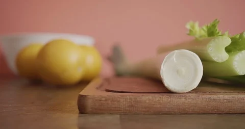 Raw vegetables lying on cutting board at home kitchen. Dolly shot Stock Footage 97822512