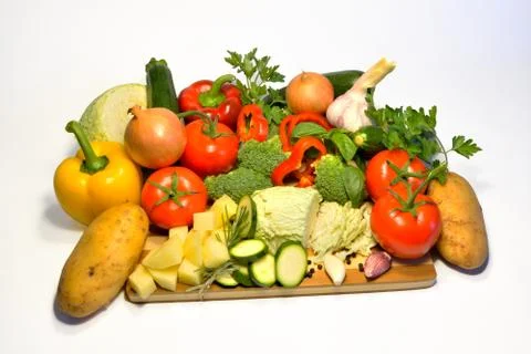 Raw vegetables, pepper tomato cabbage onion potatoes garlic  basil zucchini Stock Photos
