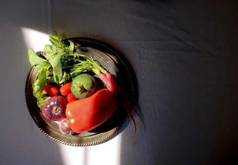 Raw vegetables on a silver platter 스톡 사진