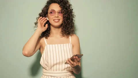 Raw video.Beautiful smiling model with afro curls hairstyle Stock Footage 142218545