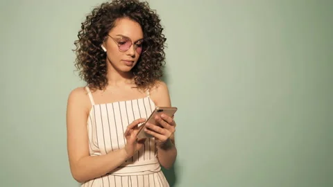 Raw video.Beautiful smiling model with afro curls hairstyle Stock Footage 142220172