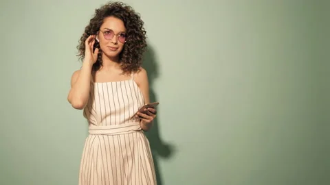 Raw video.Beautiful smiling model with afro curls hairstyle Stock Footage 142220293