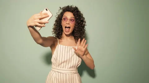 Raw video.Beautiful smiling model with afro curls hairstyle Stock Footage 142220649