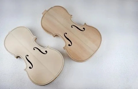 Raw violin put at the left side of white background,show front side of violin Stock-Fotos