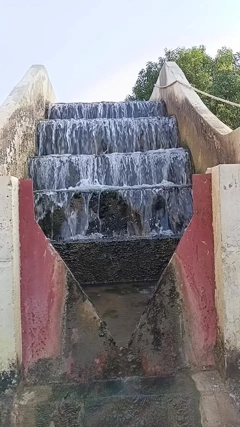 Raw Water Starting to Flow Down Cascade Aerator at Treatment Plant Stock Footage 328049342