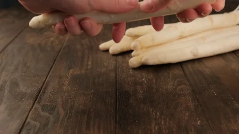 Raw white asparagus Stock Footage 128733412