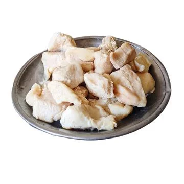 Raw White Chicken Fat Chunks on Metal Plate 스톡 사진