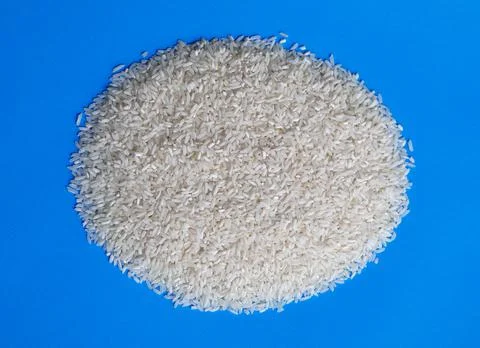 Raw white long rice Stock Photos