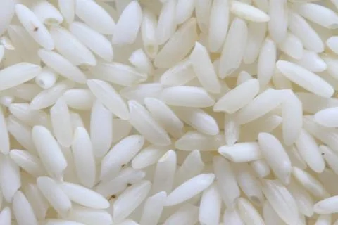 Raw white rice background macro Stock Photos