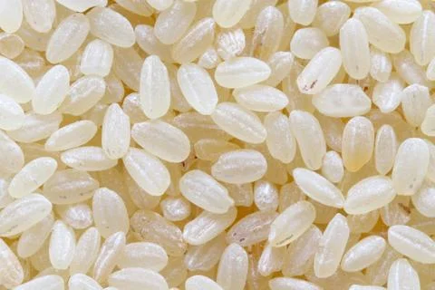 Raw white rice background macro Stock Photos