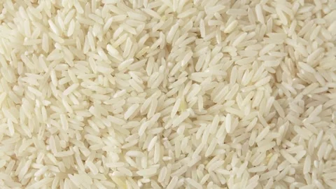 Raw, white rice. View from above. Rotation. Stock Footage 267384953