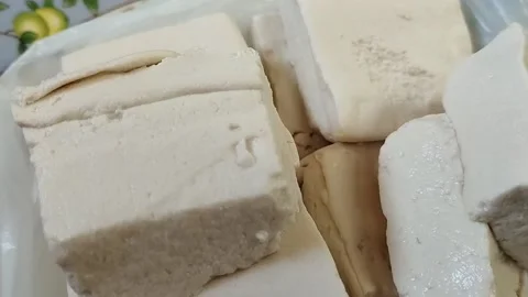 Raw white tofu that has not been fried Stock Footage 226731448