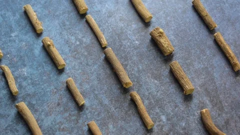 Raw whole dried Licorice root Stock Footage 247731504