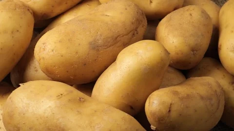 Raw whole potatoes rotating Stock Footage 340526373