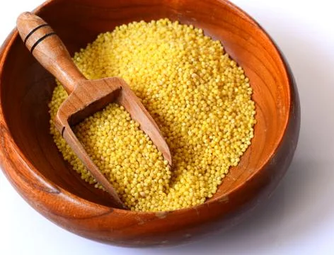 Raw yellow millet Stock Photos