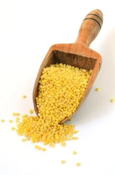 Raw yellow millet Stock Photos