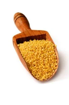 Raw yellow millet Stock Photos