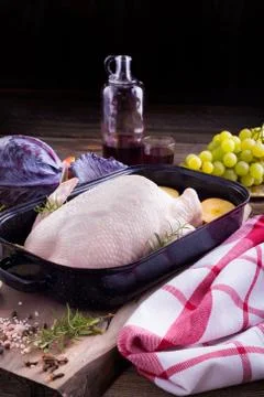 Raw young duck on a roaster Stock Photos