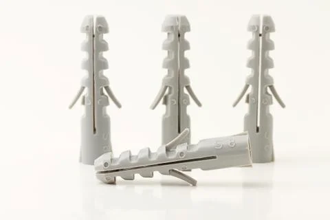 Rawlplug in front of three Stock Photos