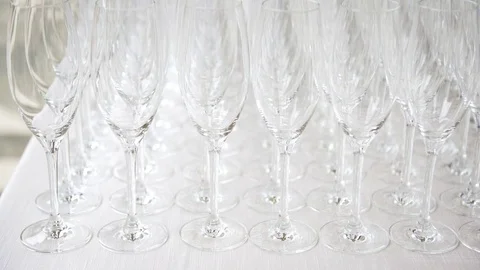 Raws of empty flutes at the wedding catering, 4K Stock Footage 72438851