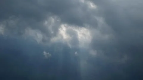 Ray of light appears from a cloud Video stock 272632465
