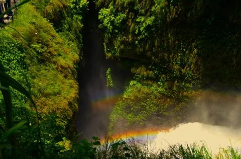 The ray of light in Devi waterfall looks like rainbow Stock Photos