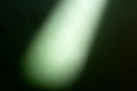 Ray of light on green background 스톡 사진