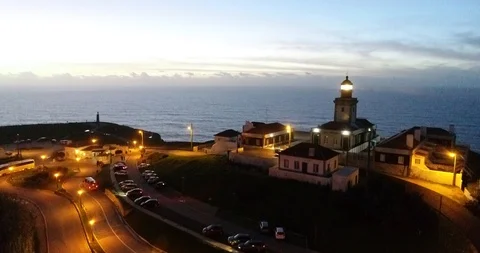 Ray of light from a lantern on a lighthouse hits the frame Portugal Stock Footage 129562754