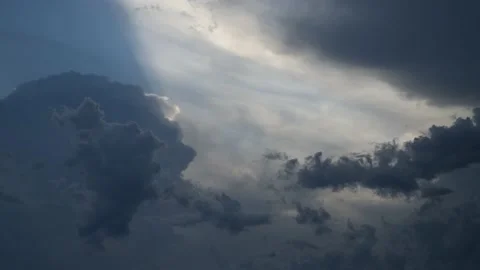 Ray of light makes a cone across the dark sky in this heavenly timelpase Vídeos de archivo 169328843