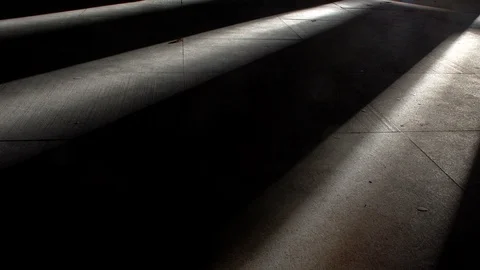 Ray of light moving along a stone floor. Time Lapse Video stock 113056639