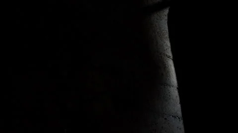 Ray of light moving along the wall of stone Stock Footage 5163496