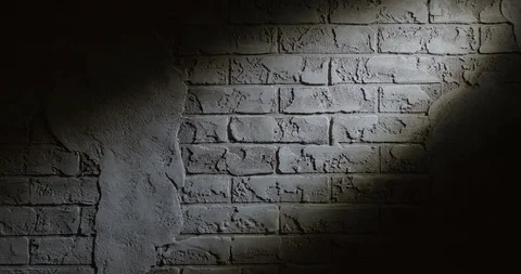 Ray of light on an old brick wall. Stock Footage 94912769