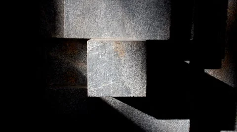 Ray of light over a stone sculpture  Vídeo Stock 907876