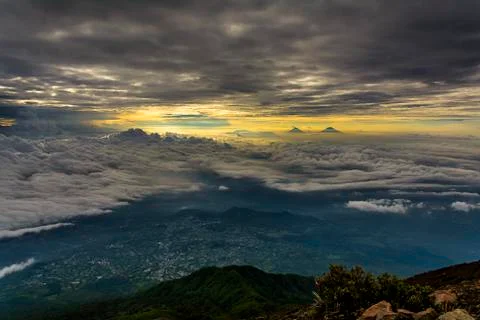 Ray of Light Sunlight Sunbeam through cloud formation Mountain Peak Morning View Stock Photos