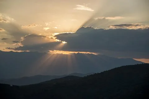 Ray of light through the clouds on the high mountain, beautiful scenery. Stock-Fotos