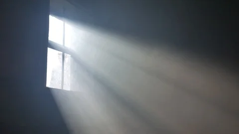 Ray of light from a window in a room filled with smoke. Video stock 121158765