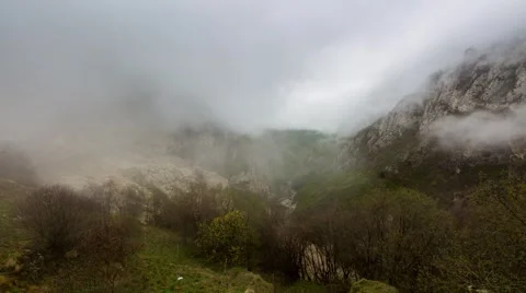 A ray of sun and clouds in the mountains. Video stock 50683804